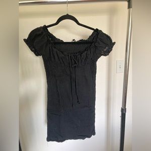 Black body hugging mini dress